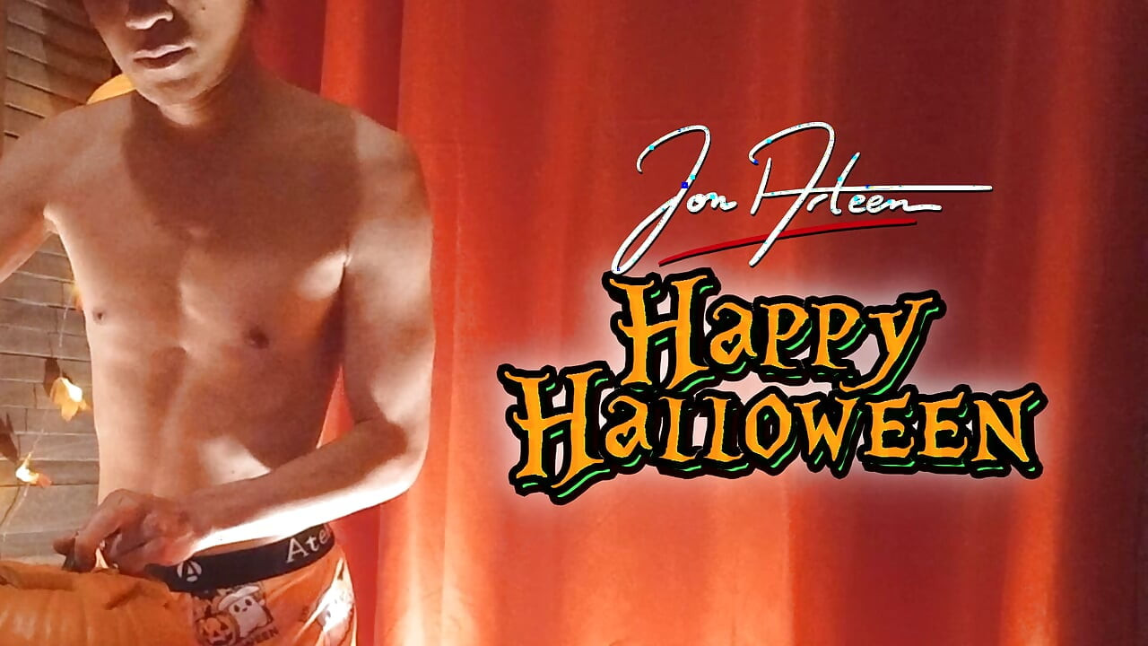Cute twink Jon Arteen performs a sensual dance while carving a Halloween pumpkin