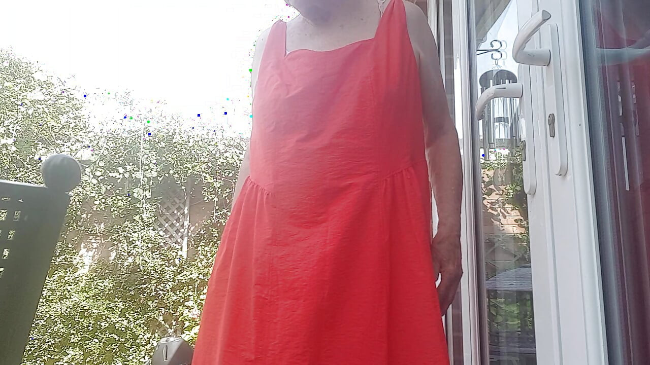 Lady in red in the sunshine