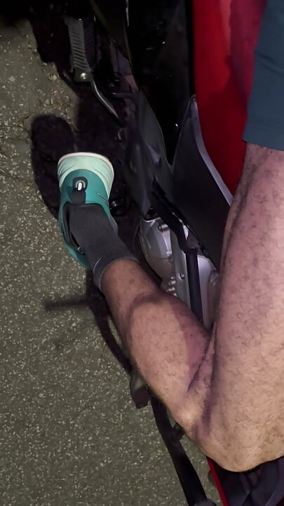 Big, beautiful penis of a Brazilian model on a motorcycle without underwear, showing it off in public.