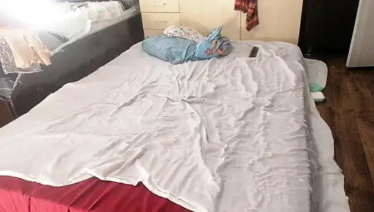 Sexy brunette doing naked chores around the house.