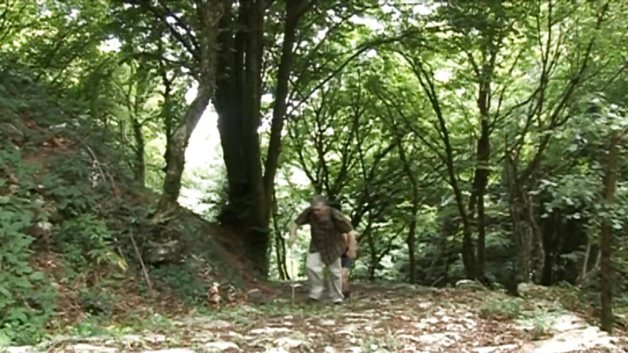 Naughty teen gets fucked by a mature guide in the woods