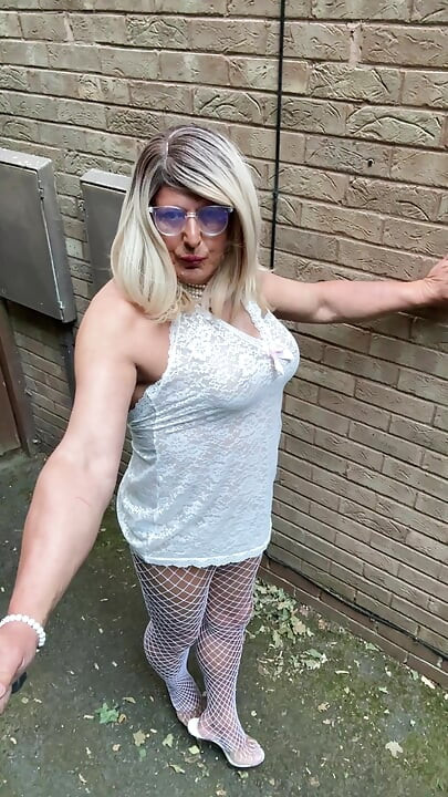Sexy Crossdresser kellycd2022 in white lace outfit fishnet pantyhose and heels