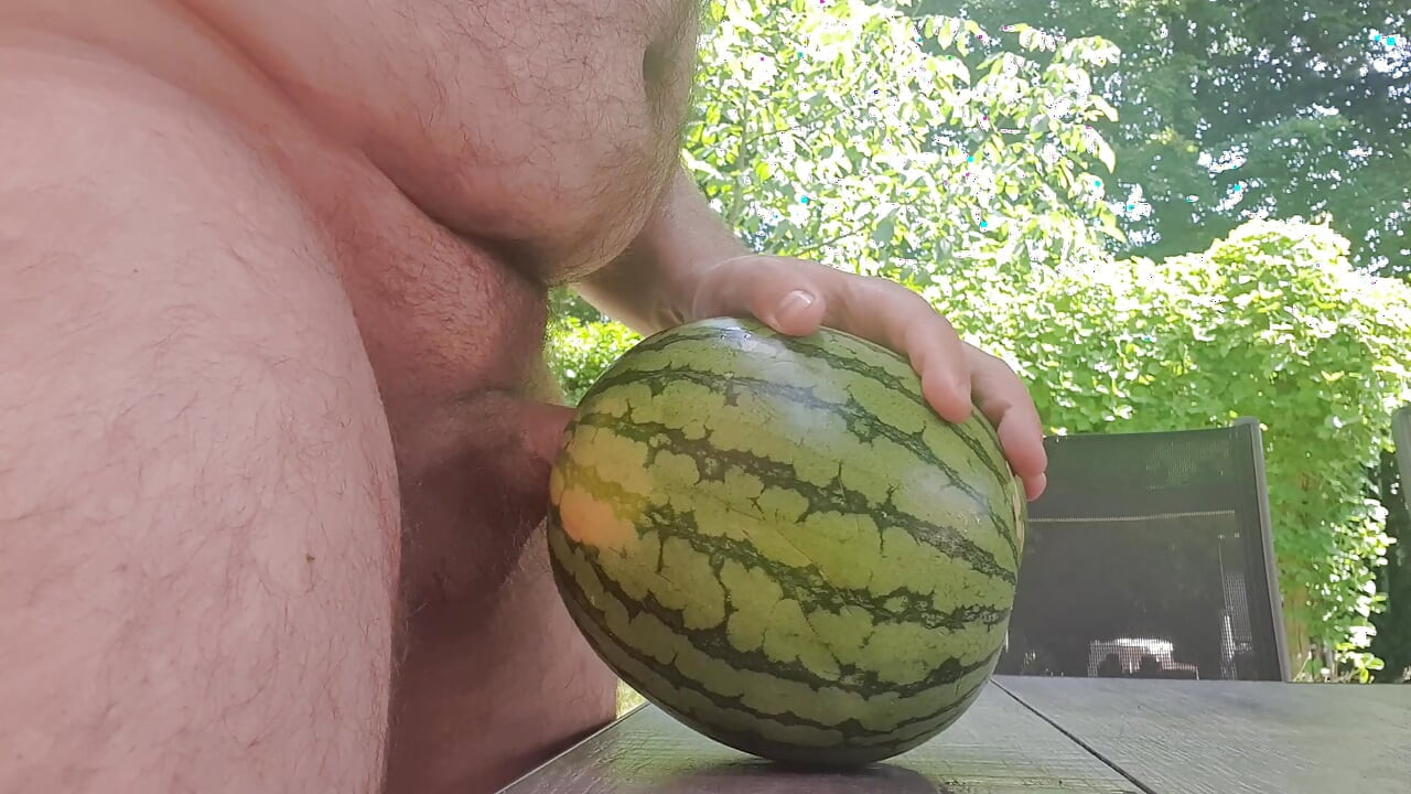 Horny nudist fuck melon at home in the garden