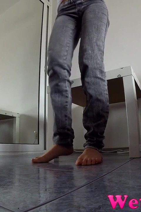 Wetting Her Jeans Really Well.