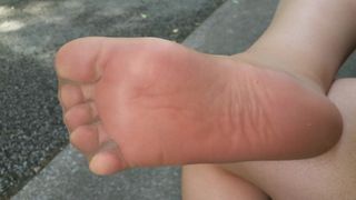 pantyhose feet & soles tease from outdoor track!