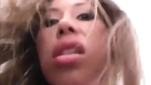 Busty amateur smokes a cig while getting her pussy stroked