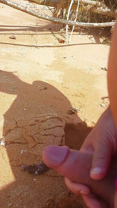 Ladysilva masturbating his cock on a deserted beach until he cums hot