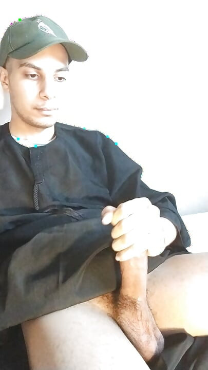 Arab daddy with a mustache shakes his big cock