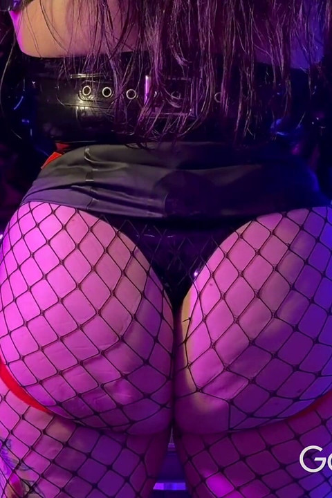 Rubber Gimp Pegged in Chastity