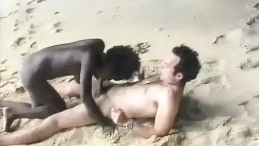 Sexy French ebony gets her tits sprayed on the beach