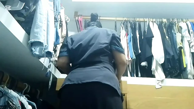 MILF maid masturbates her big ass in her boss's locker room while he works