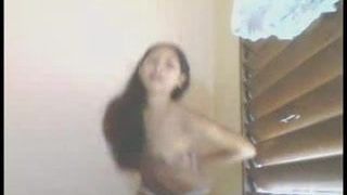 Asian slut fingers herself in the webcam