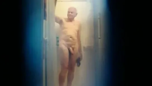 Well hung old man having a shower