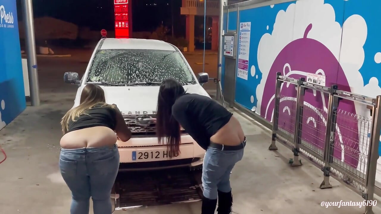 Two girls washing the car with butt cracks out