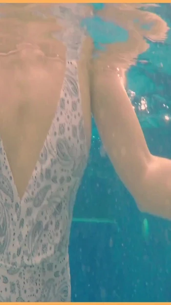 Memorable moment from "Wifey stuns everyone in amazing hot one piece bathers and flashes her perfect tits."