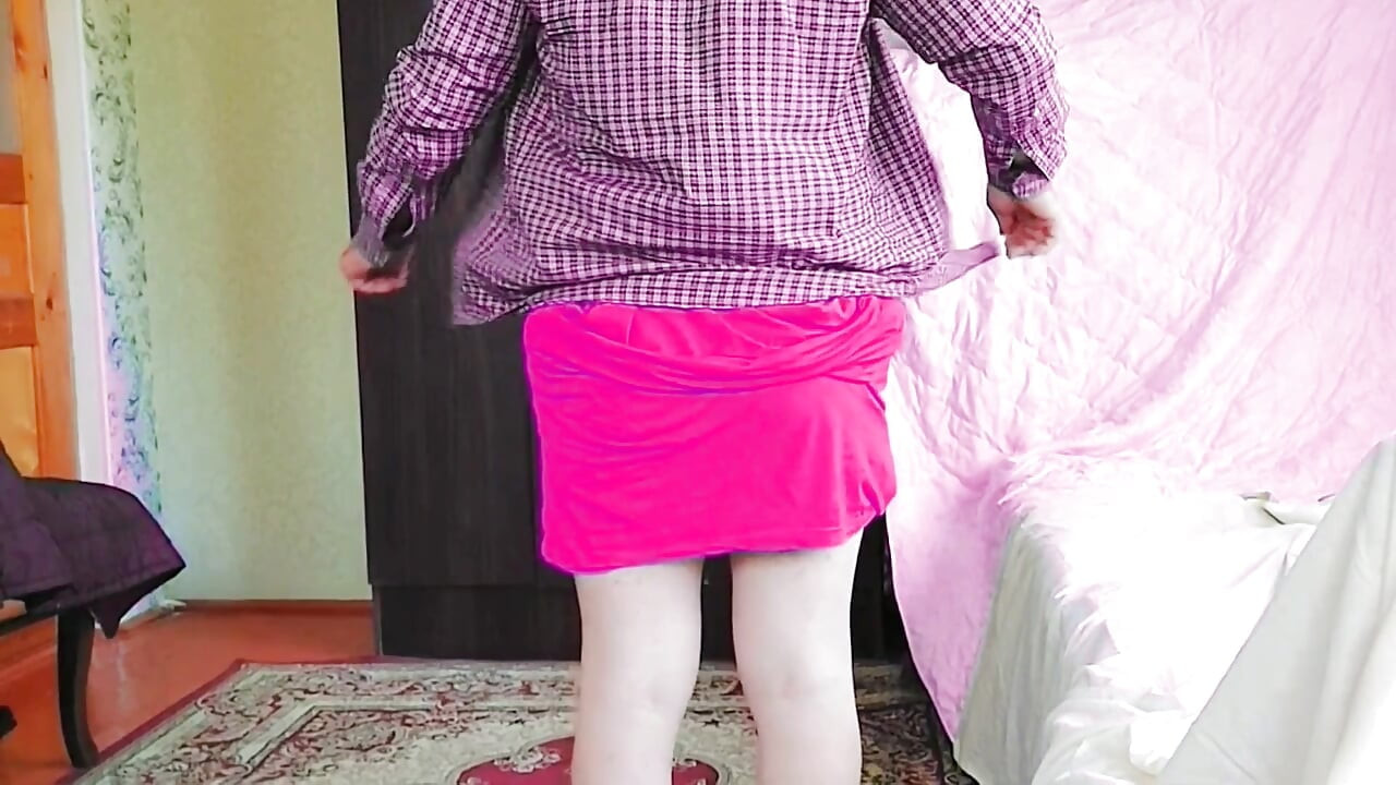 Sweet shemale walking through garden in summer breeze