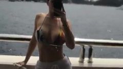 'Kylie J.' in a bikini on a boat
