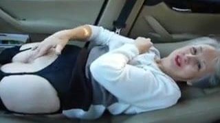 Beautiful granny masturbates in her car