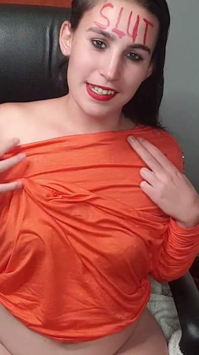 Slut talking dirty to her cock viewers while stripping and rubbing her pussy | Clip 1