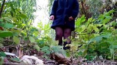 Russian milf in boots and sexy stockings pissing outdoors