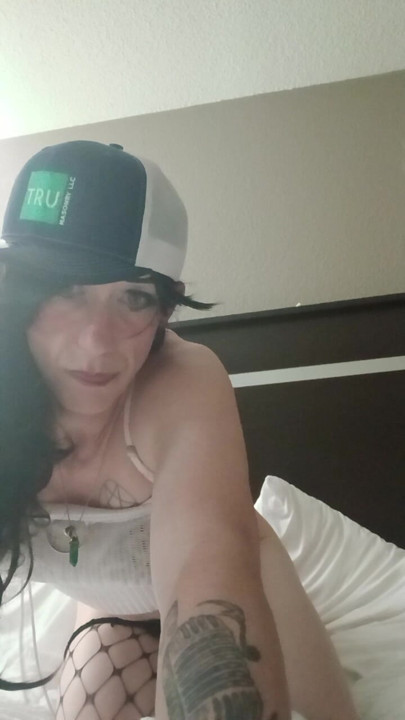 Amatuer Crossdresser Taylor showing off her ass in motel room