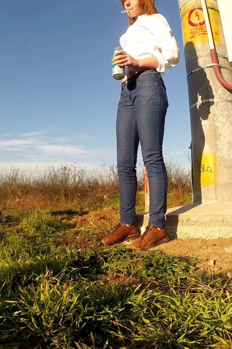 Wetting her jeans really well
