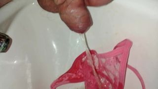 A piss after the wank in the pink panties