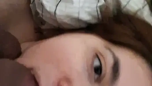 Sitting on top of me, he fills my greedy mouth with his thick cock that I swallow up to the balls while watching him