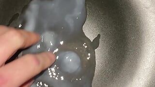 Huge cumshot on a plate with some cumplay