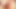 毛深いブロンドの女性が屋外でニンジンで膣を満たす