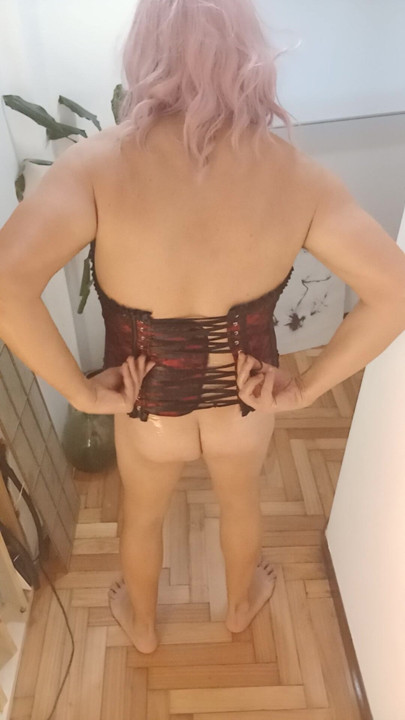 Sissy puts on her corset