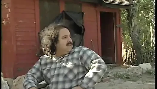 Two guys watch a slutty blond get fucked in her pussy by a machine