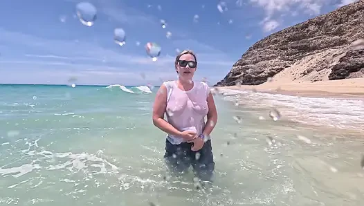 Girl Wetting Jeans in the Ocean and Swimming in Wet White T-shirt
