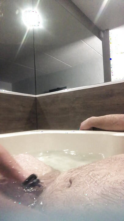 Flab fun in a jacuzzi! Slim n sexy Rachel Wriggler has slippy sliding soapy fun with a big chubby bear