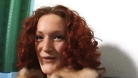 Cute redhead fingering her love hole