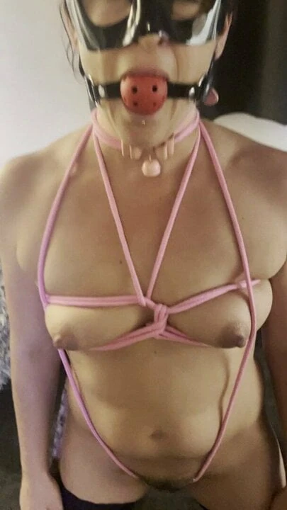 Slave wifey tied up with pink rope and made to kneel