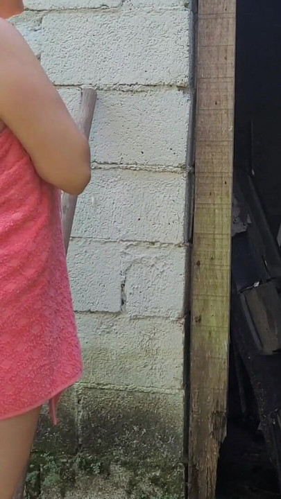 Key moment from "Shower doesn't work, married woman asks the farm's caretaker for help using just a towel and pays with sex"