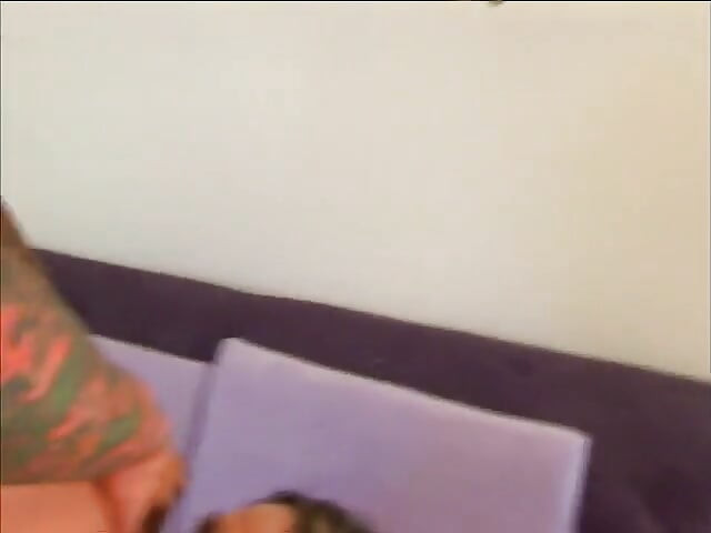 Tattooed stud gets his hard cock sucked dry by enchanting brunette