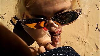 Blowjob from a mature mom on the beach