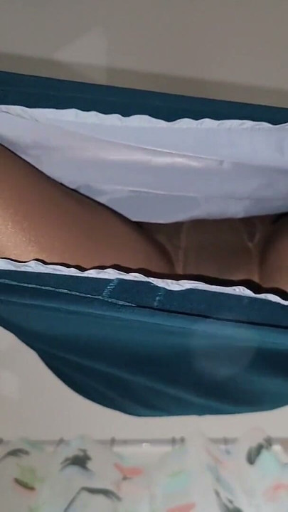 Blue office skirt with a white lining. | Clip 1