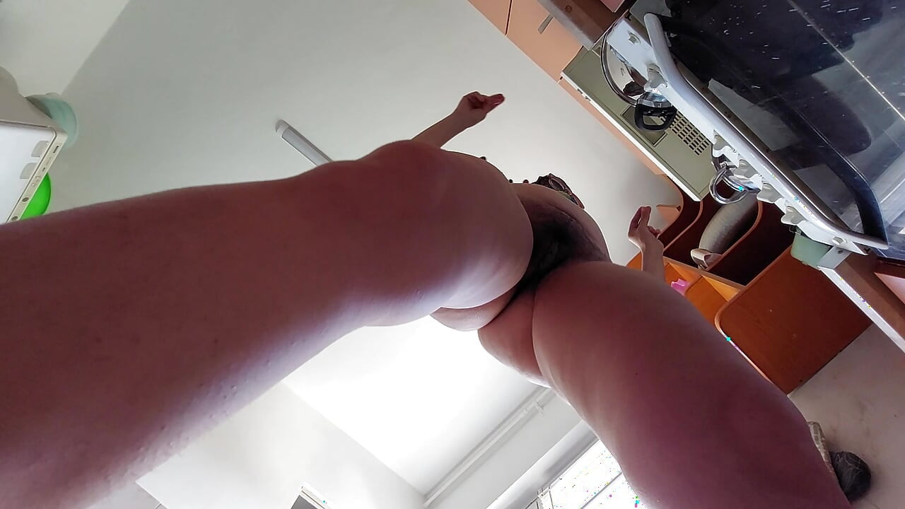 Sexy mom prepares breakfast, hairy pussy, big tits.