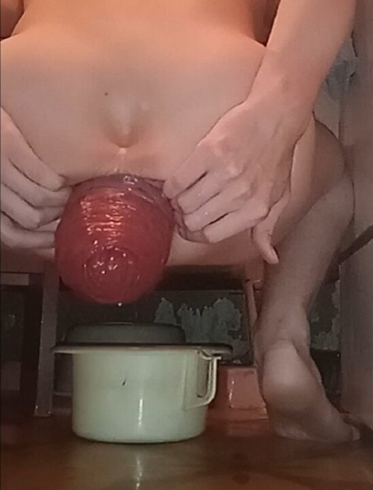 A young guy squatting, pushing and squeezing out a sweetly gigantic anal prolapse in his bathtub while no one is watch