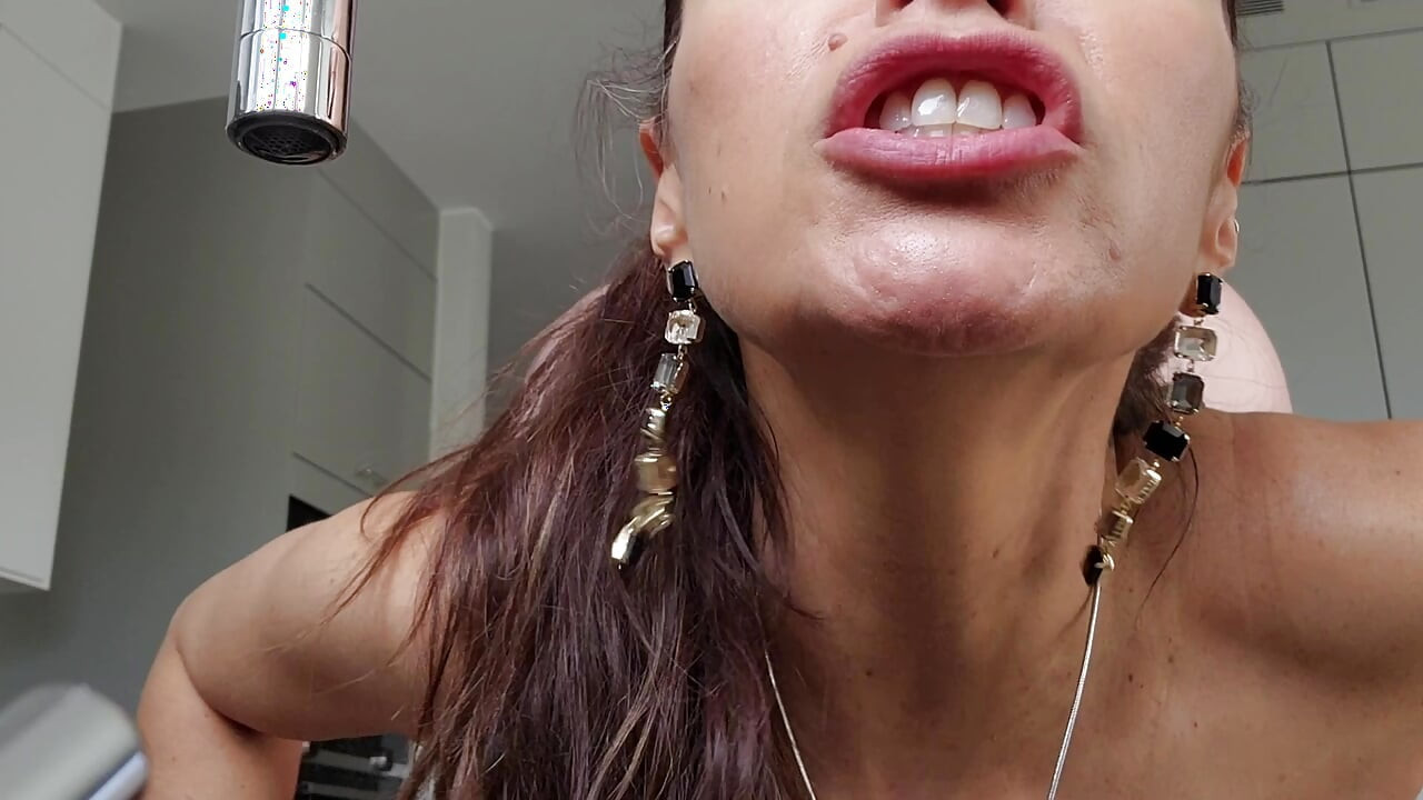 Beautiful MILF gets her ass fucked hard while washing the dishes