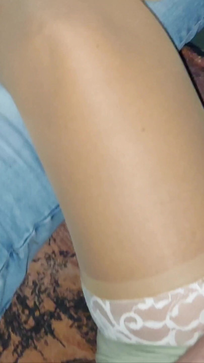 Horny wife in stockings teases her neighbor and gives him a footjob on the couch | Clip 1