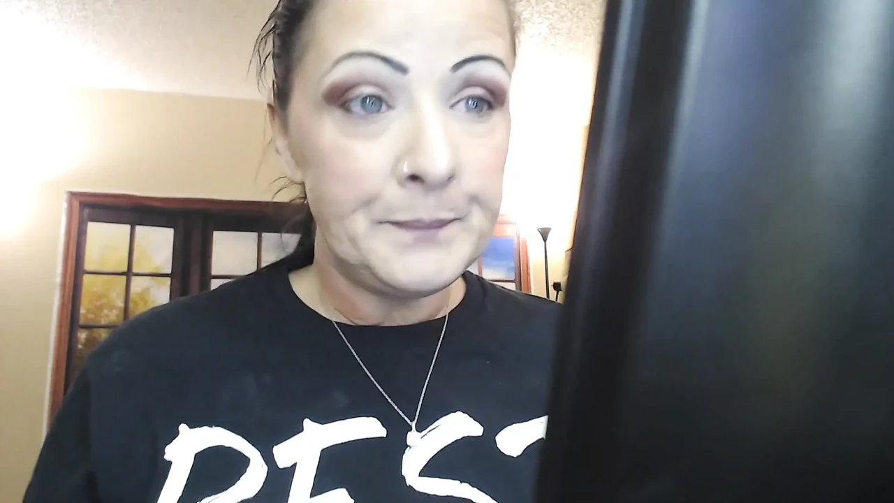 Doing make up dangling smoke