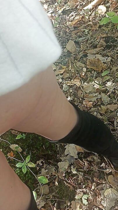 Slut Jade in the wood shows off in front of voyeur