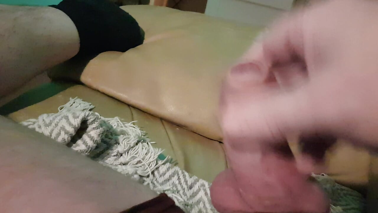 My Friend Is Lying on the Sofa in the Wet on a Wet Little Hole, He Jerks off His Cock