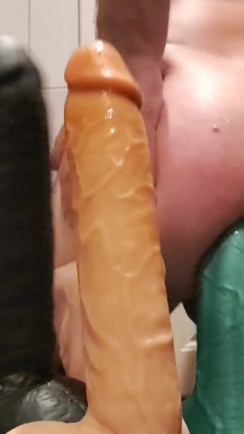 Anal6Slave plays a little to pass the time with his dildos | Clip 1