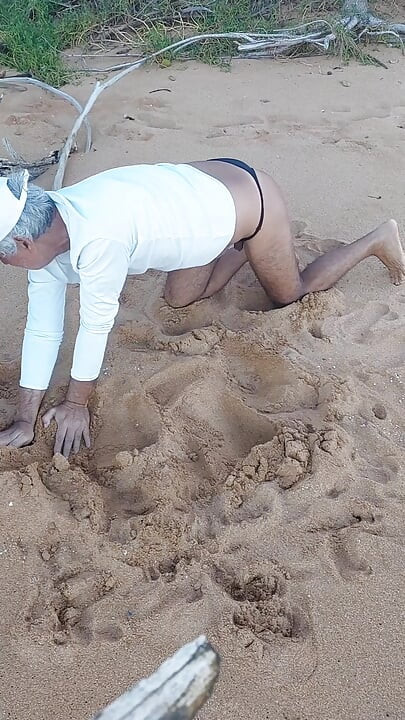 Ladysilva on the beach in panties showing off her sexy ass