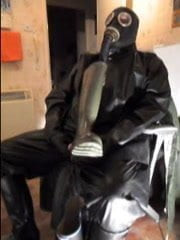 Cock play in black rubber